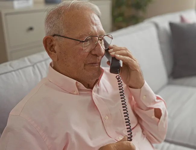 Elderly man on phone